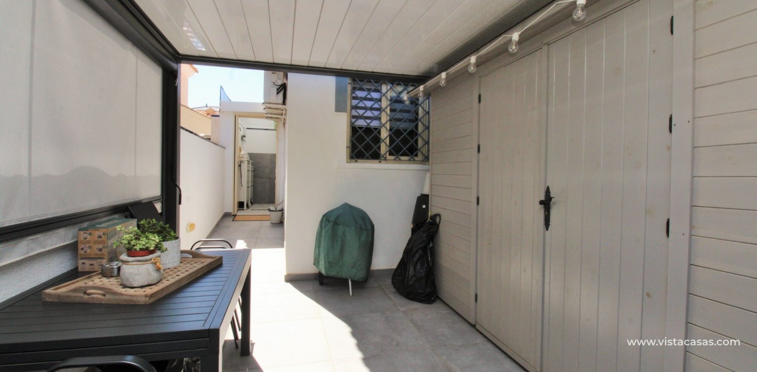 Beachside semi-detached house for sale in Mil Palmeras with private swimming pool side terrace