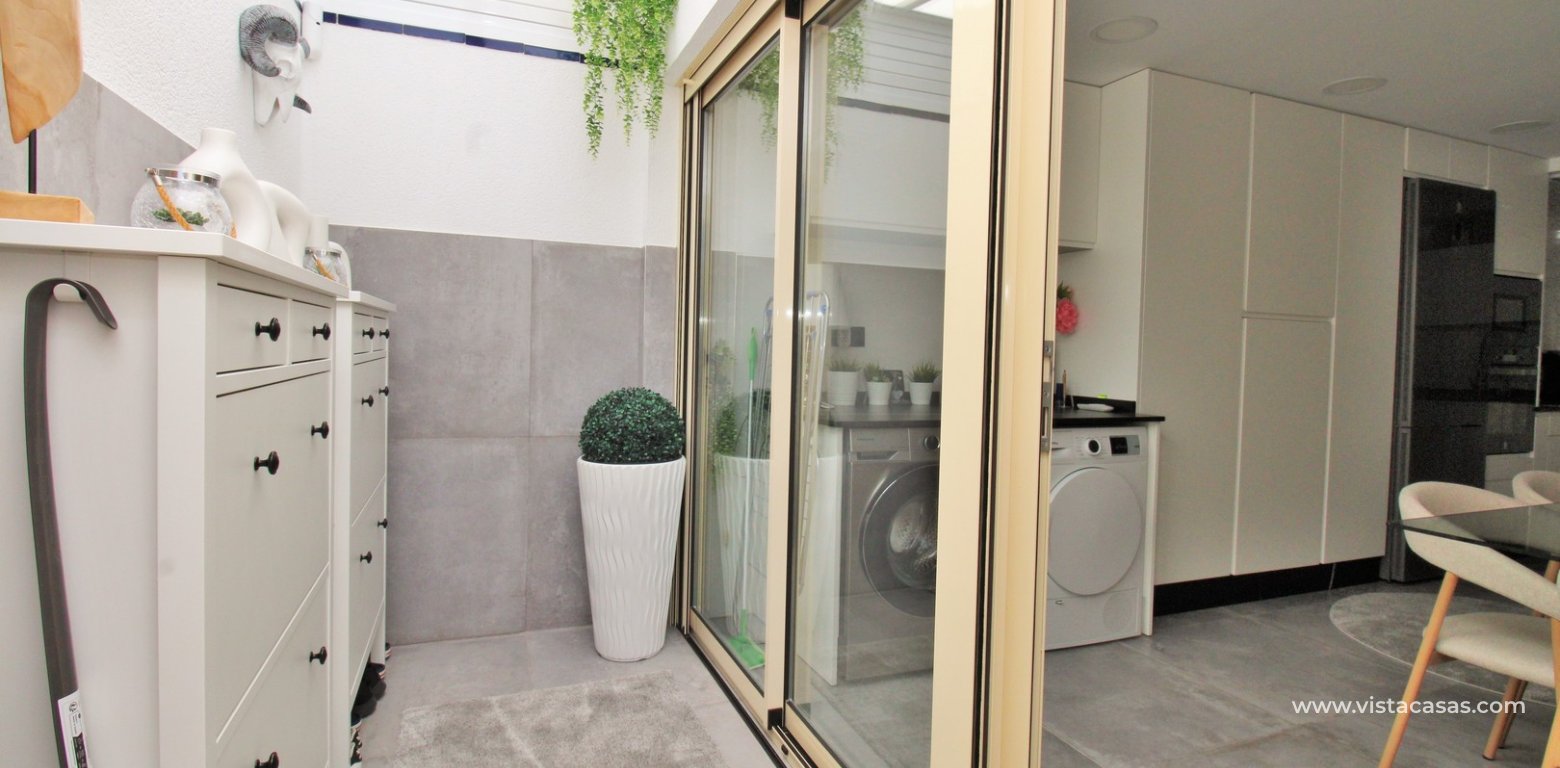 Beachside semi-detached house for sale in Mil Palmeras with private swimming pool utility space
