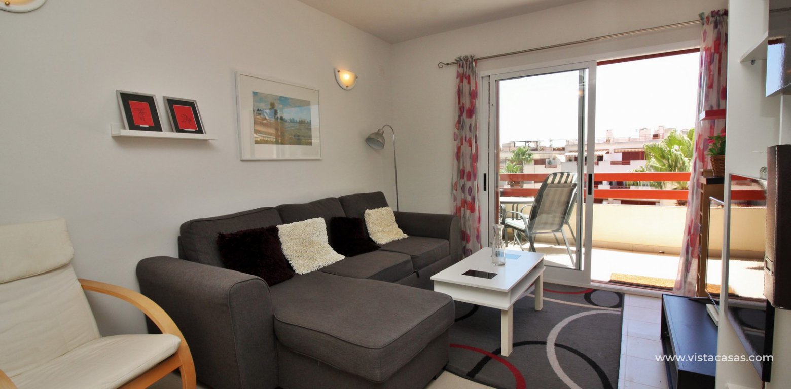 South facing penthouse apartment for sale in El Rincon Playa Flamenca lounge area