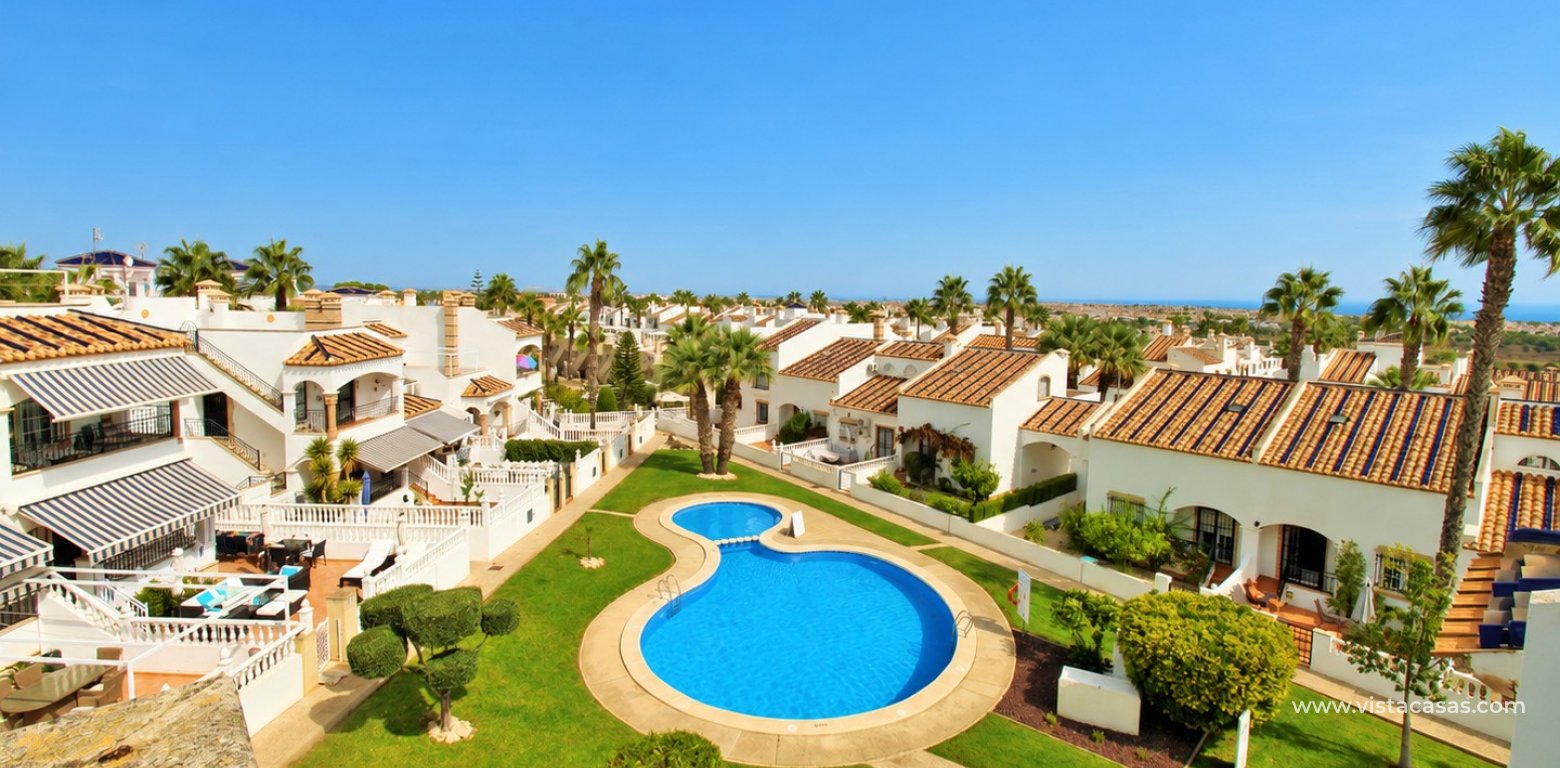 Top floor apartment with sea and pool views in for sale in Las Violetas Villamartin pool view