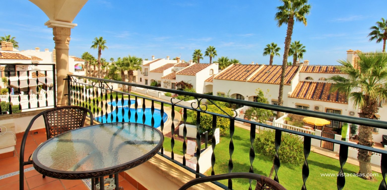 Top floor apartment with sea and pool views in for sale in Las Violetas Villamartin balcony pool view