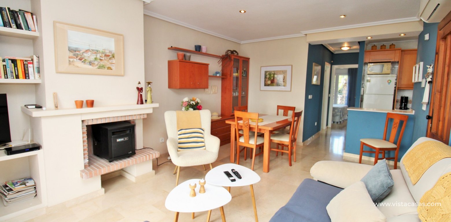 Top floor apartment with sea and pool views in for sale in Las Violetas Villamartin lounge 2