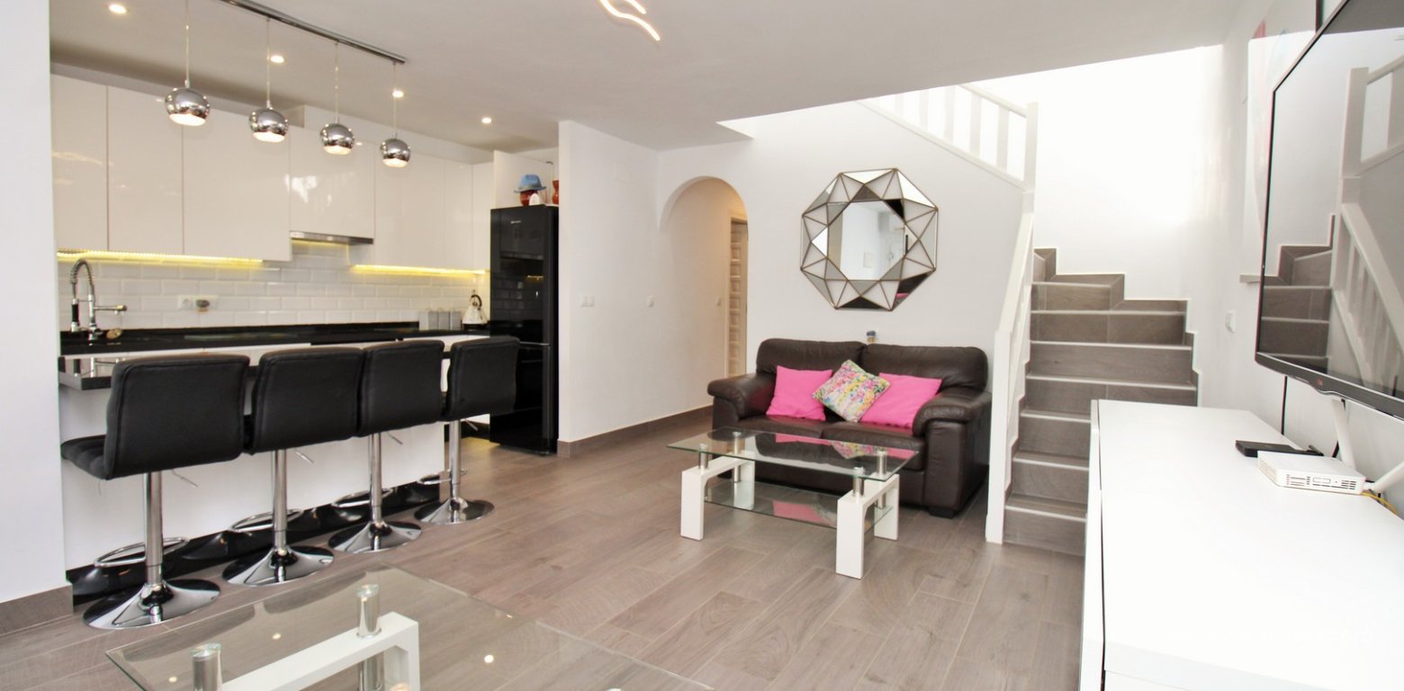 ully renovated 3 bedroom Buhardilla townhouse for sale in Verdemar III Villamartin lounge 2
