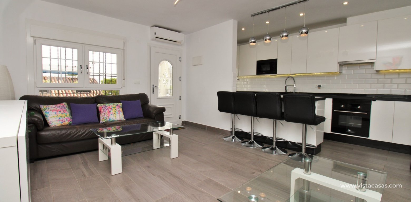 ully renovated 3 bedroom Buhardilla townhouse for sale in Verdemar III Villamartin lounge 3
