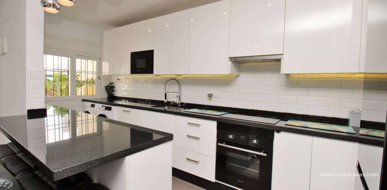 ully renovated 3 bedroom Buhardilla townhouse for sale in Verdemar III Villamartin kitchen