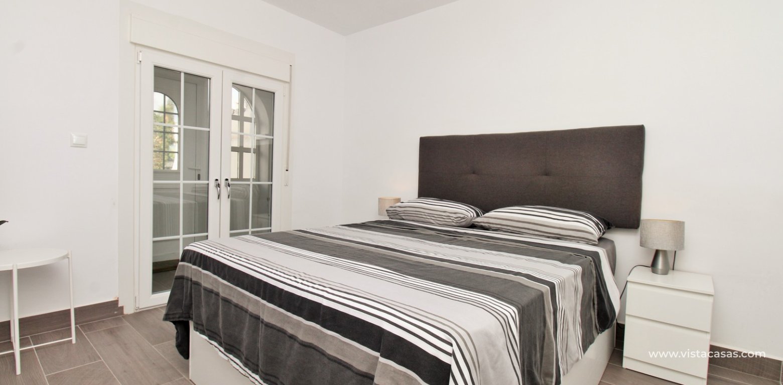 ully renovated 3 bedroom Buhardilla townhouse for sale in Verdemar III Villamartin double bedroom