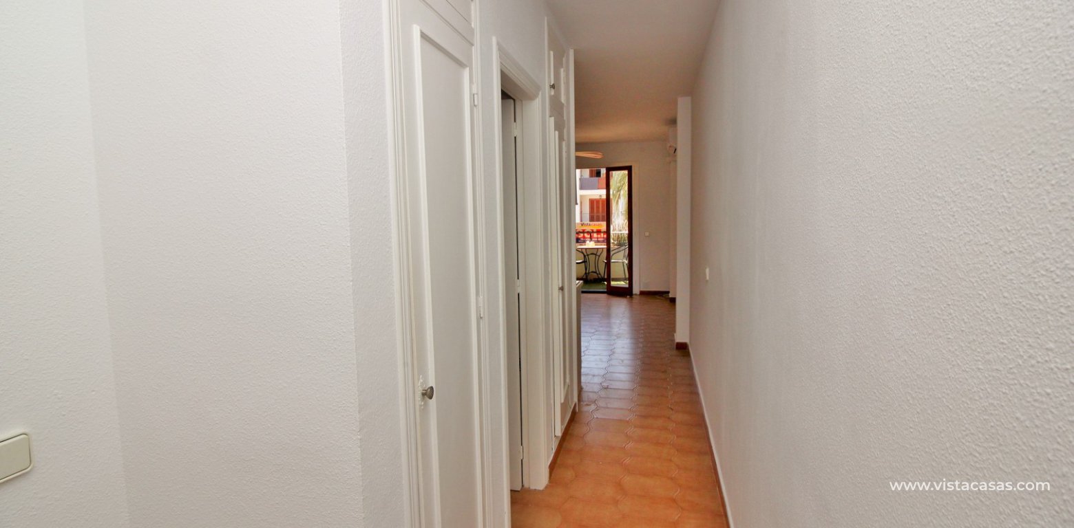 South facing studio apartment for sale in the Villamartin Plaza hallway