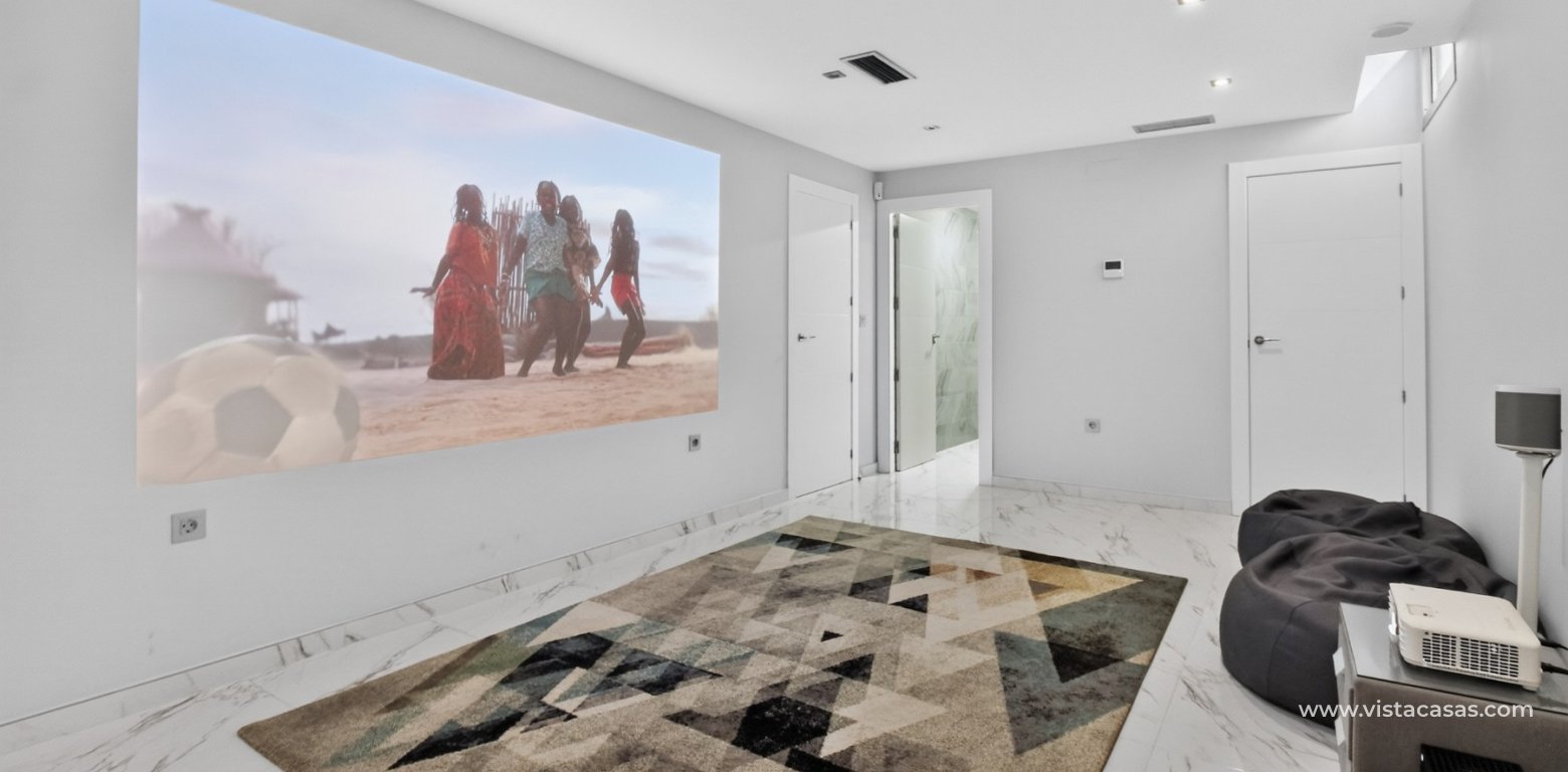 South-facing 4 bedroom villa for sale in Pink Paradise Villamartin underbuild cinema room