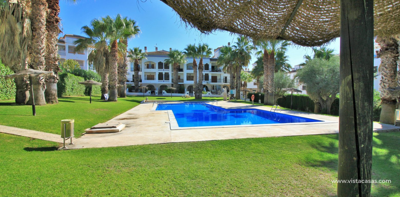 Apartment for sale with golf views and tourist licence Villamartin Plaza communal gardens