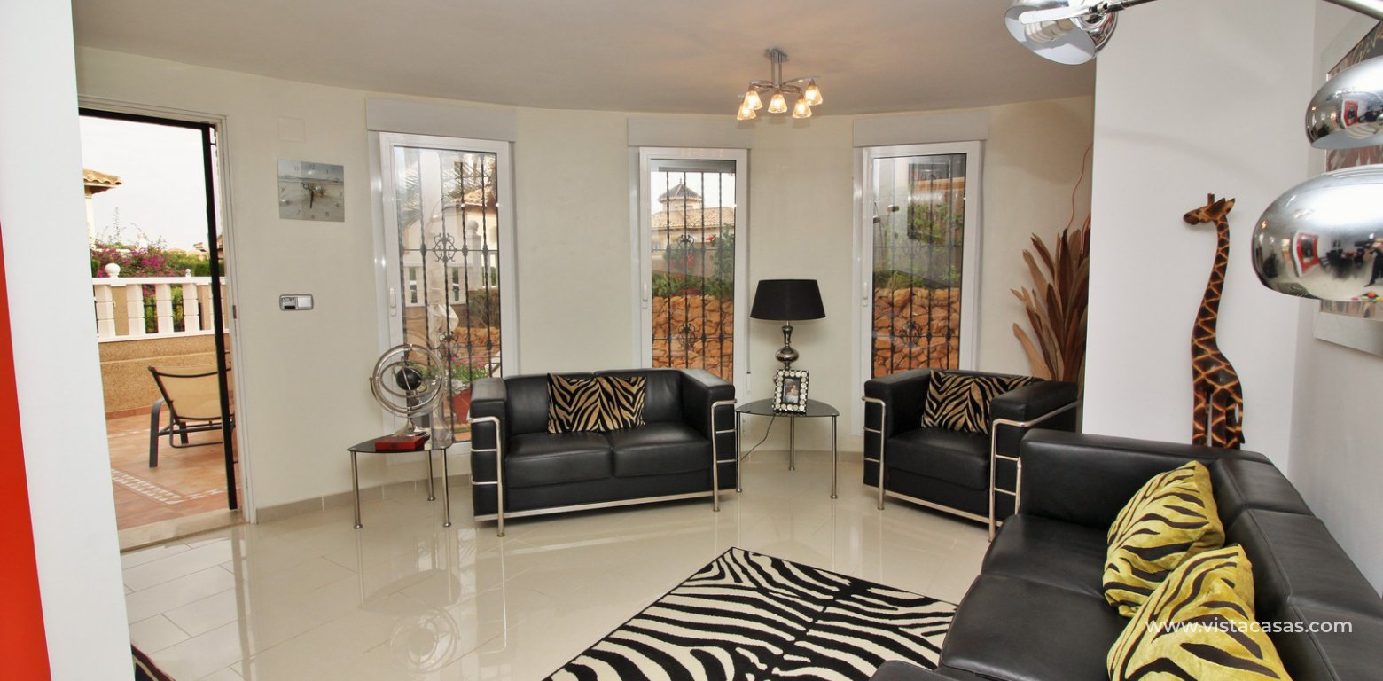 5 bedroom detached villa with garage for sale in Pinada Golf Villamartin annex lounge 2