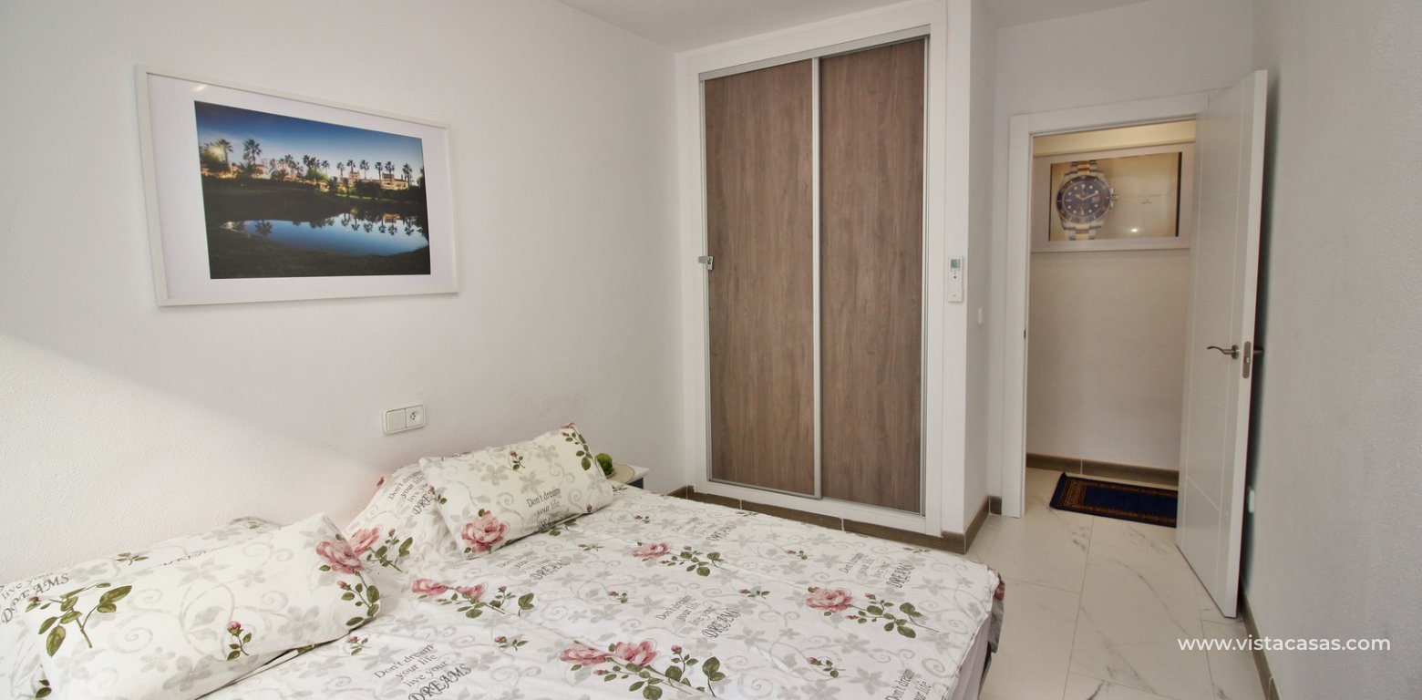 Renovated South facing apartment for sale Villamartin Plaza master bedroom fitted wardrobes