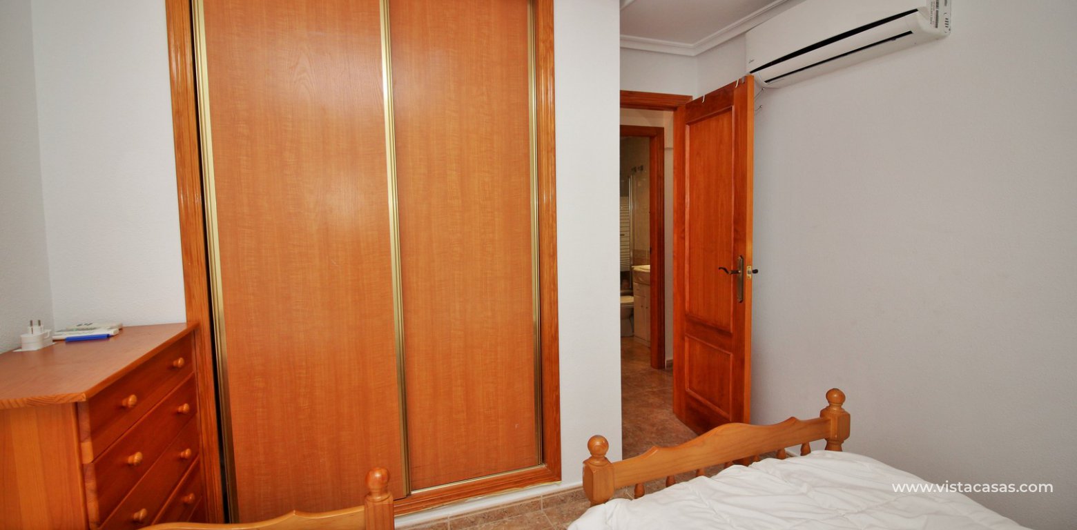 Apartment for sale Playa Marina Cabo Roig master bedroom fitted wardrobes