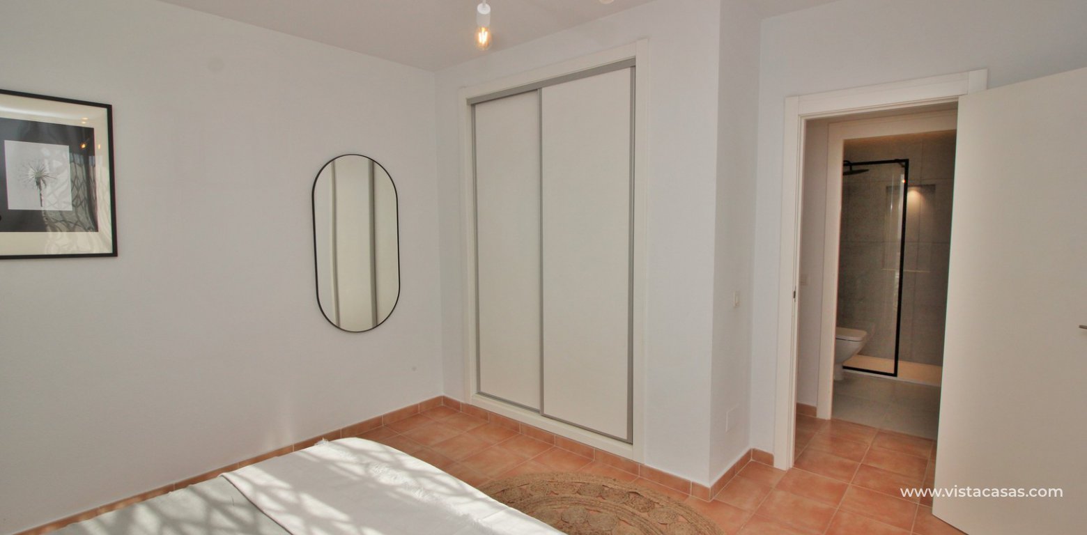 South facing renovated townhouse for sale Panorama Golf Villamartin master bedroom fitted wardrobes
