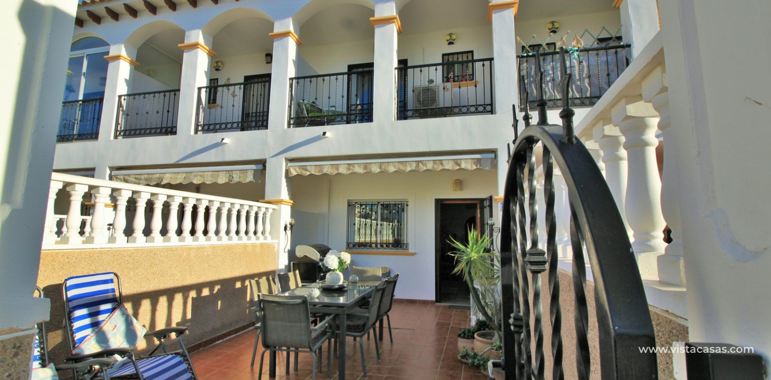 Townhouse for sale overlooking the pool R15 La Ciñuelica Punta Prima front of house