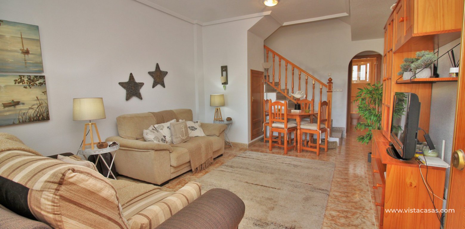 Townhouse for sale overlooking the pool R15 La Ciñuelica Punta Prima lounge