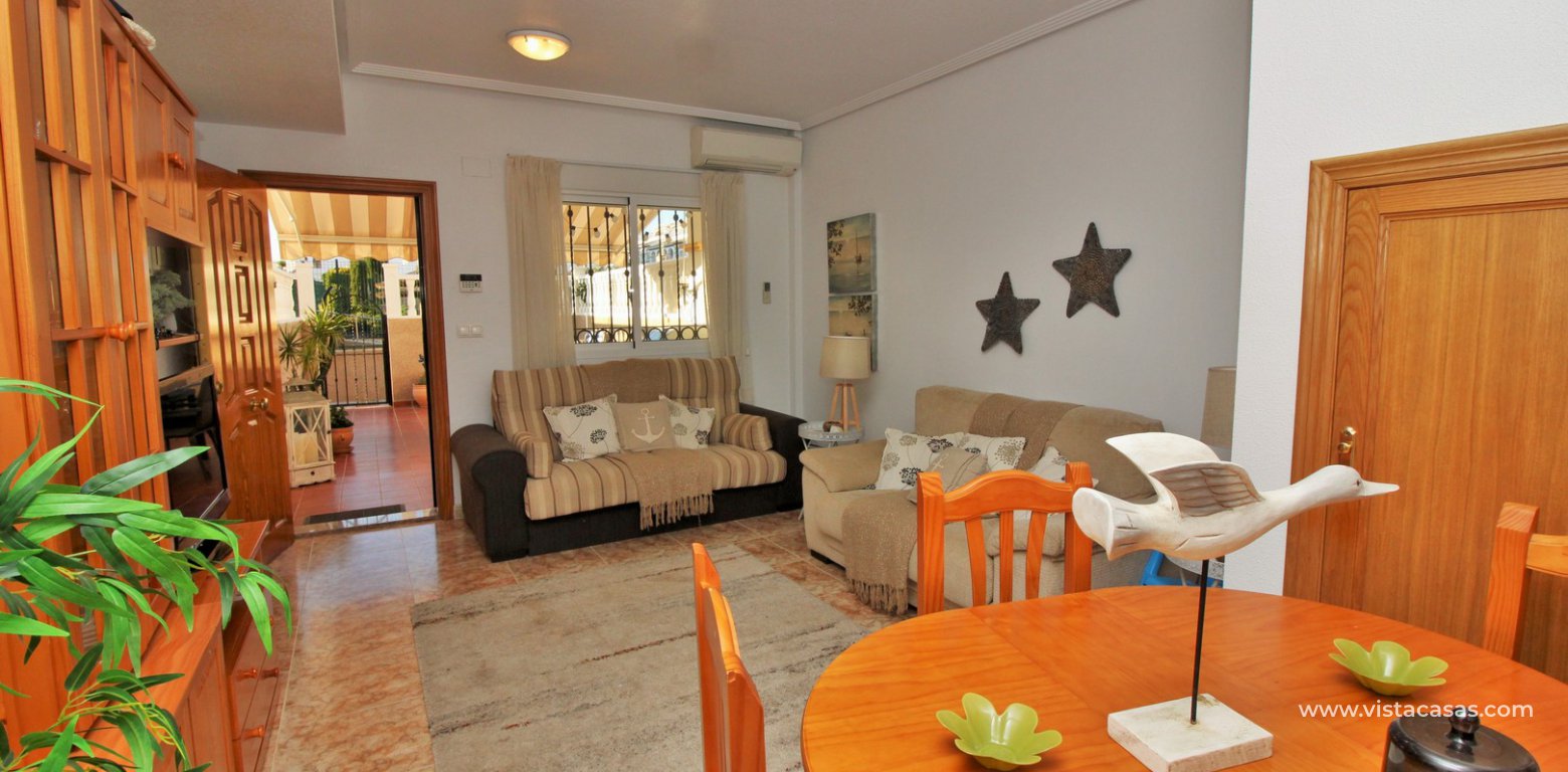 Townhouse for sale overlooking the pool R15 La Ciñuelica Punta Prima living room