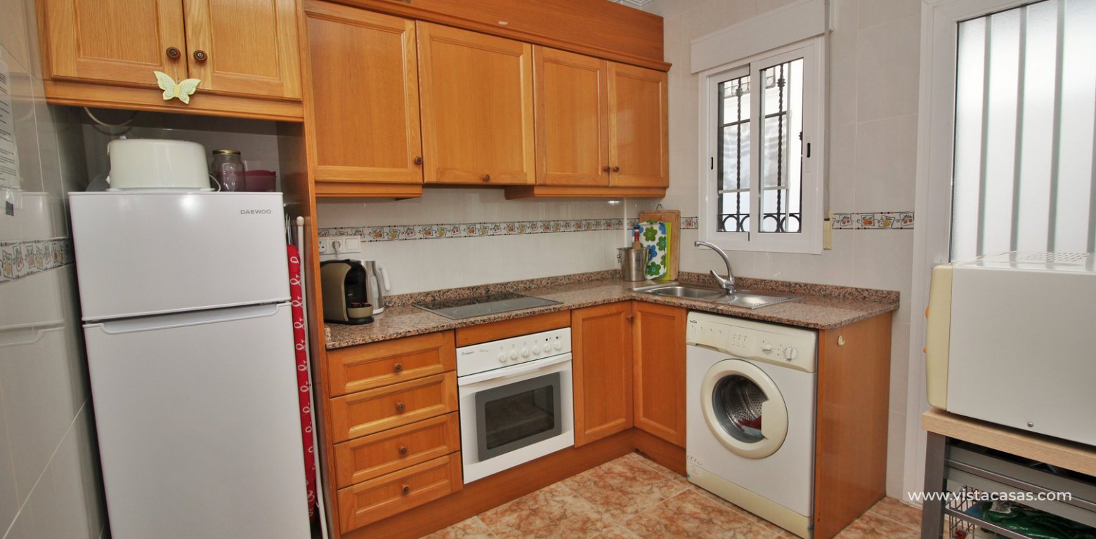 Townhouse for sale overlooking the pool R15 La Ciñuelica Punta Prima kitchen