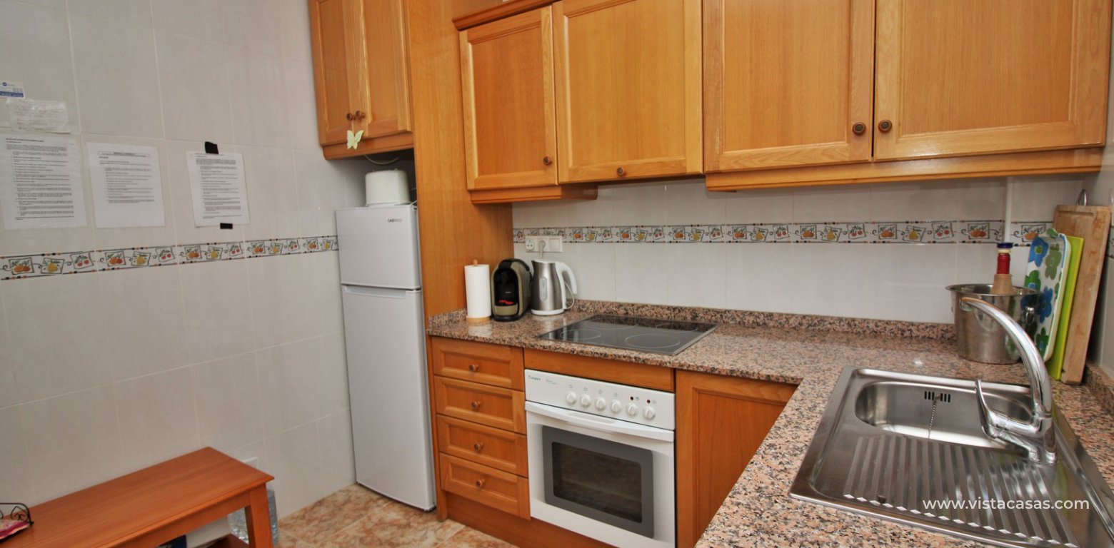 Townhouse for sale overlooking the pool R15 La Ciñuelica Punta Prima kitchen 2