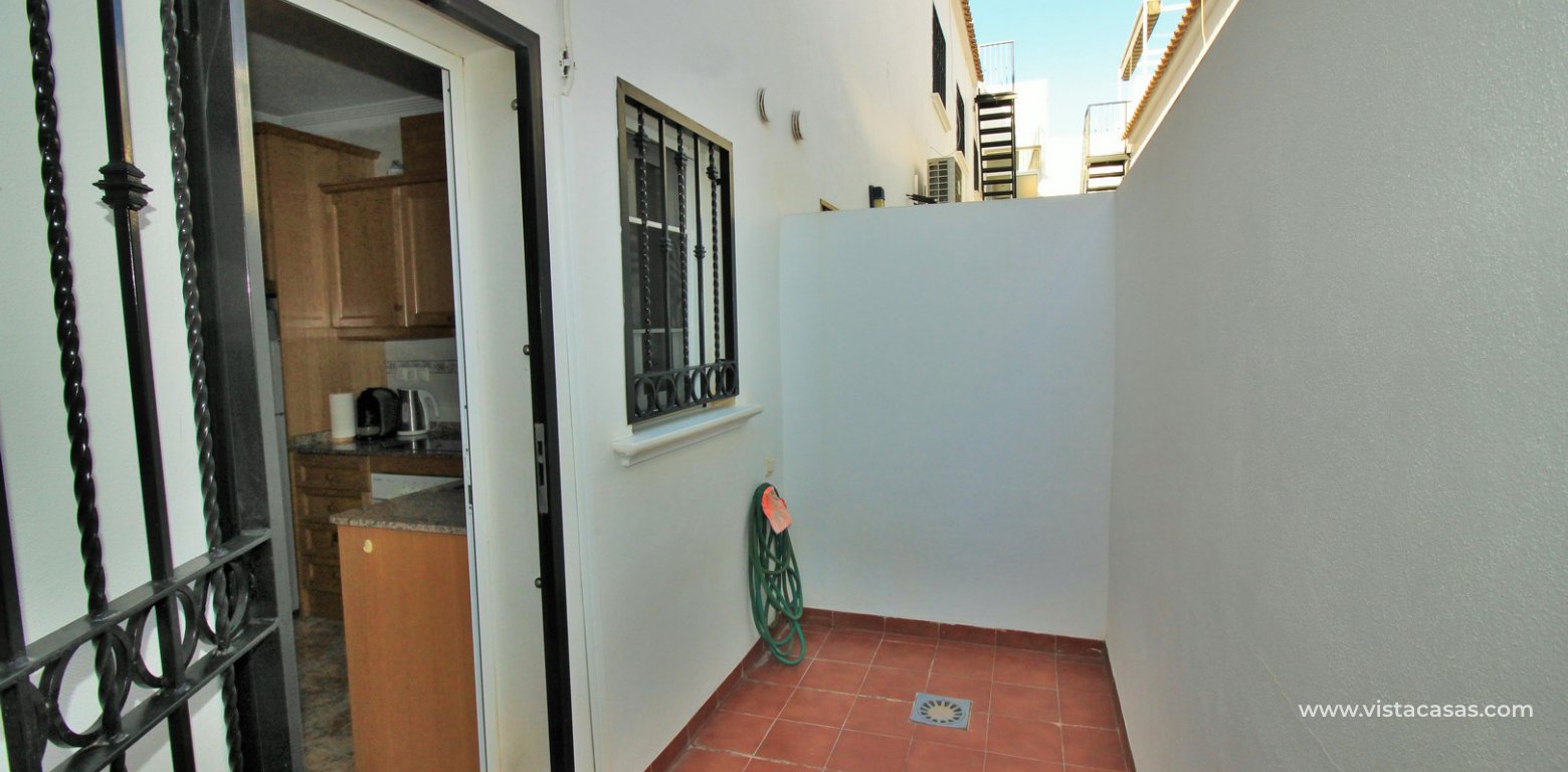 Townhouse for sale overlooking the pool R15 La Ciñuelica Punta Prima utility area
