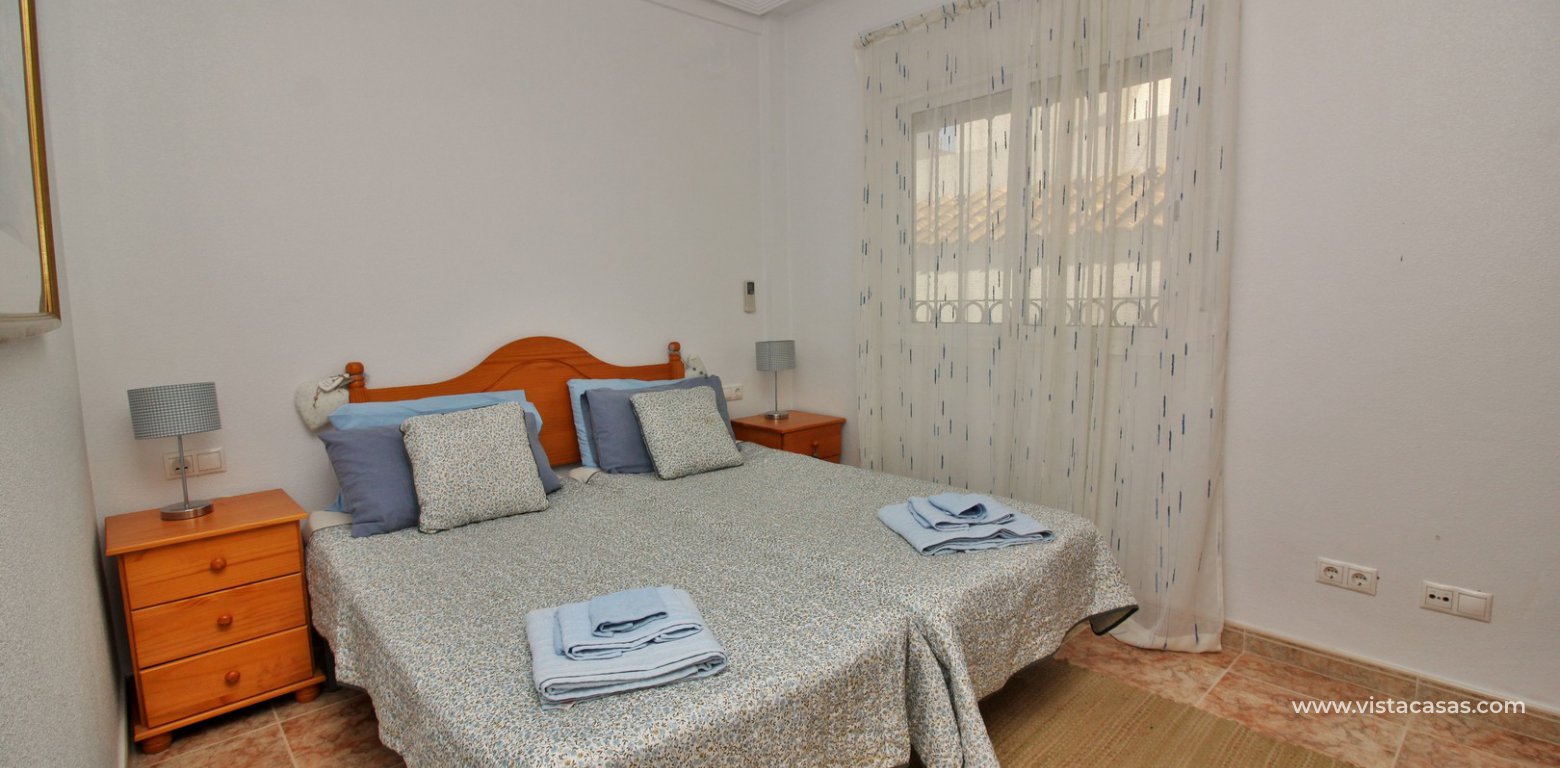 Townhouse for sale overlooking the pool R15 La Ciñuelica Punta Prima master bedroom