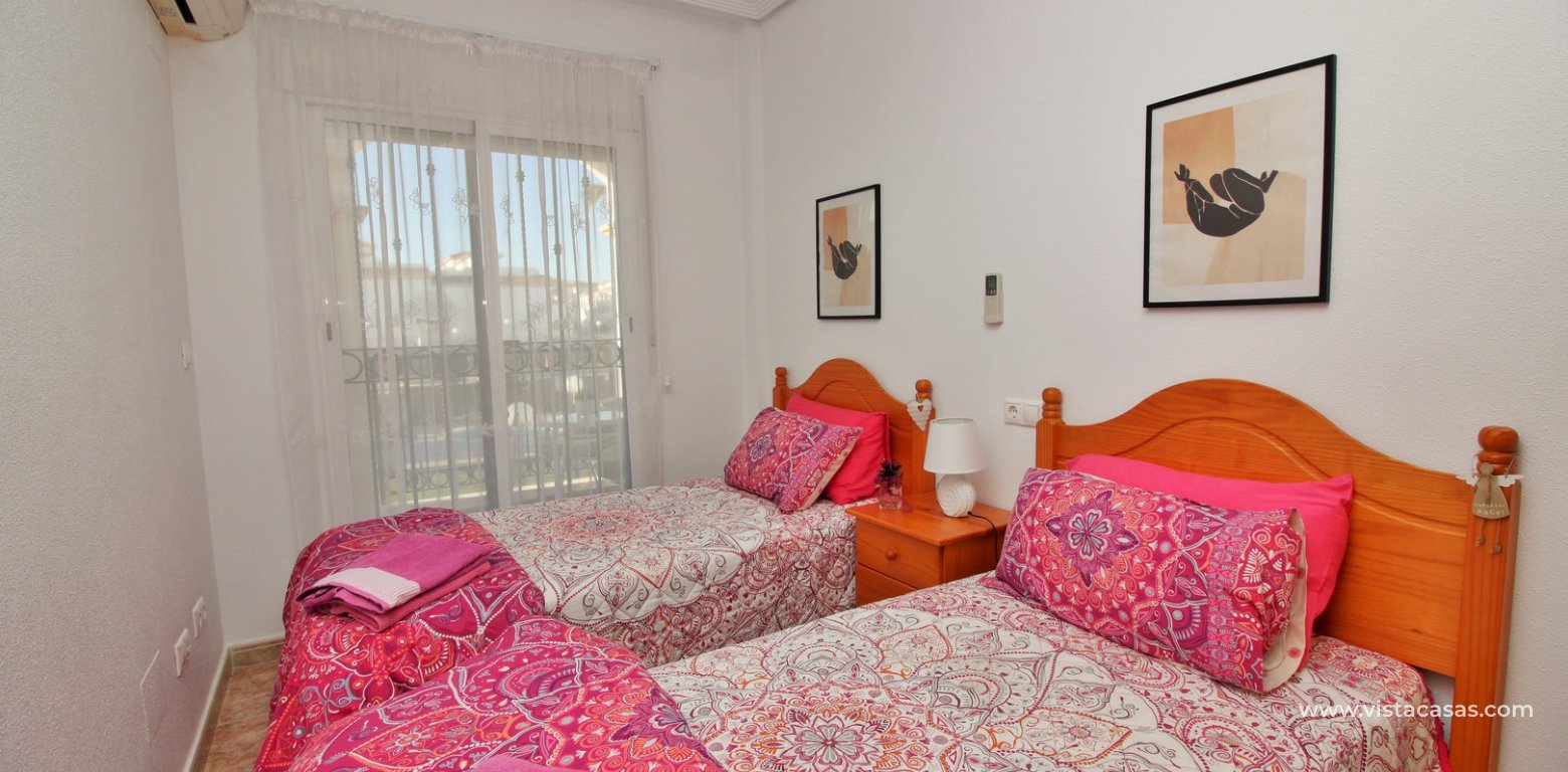 Townhouse for sale overlooking the pool R15 La Ciñuelica Punta Prima twin bedroom