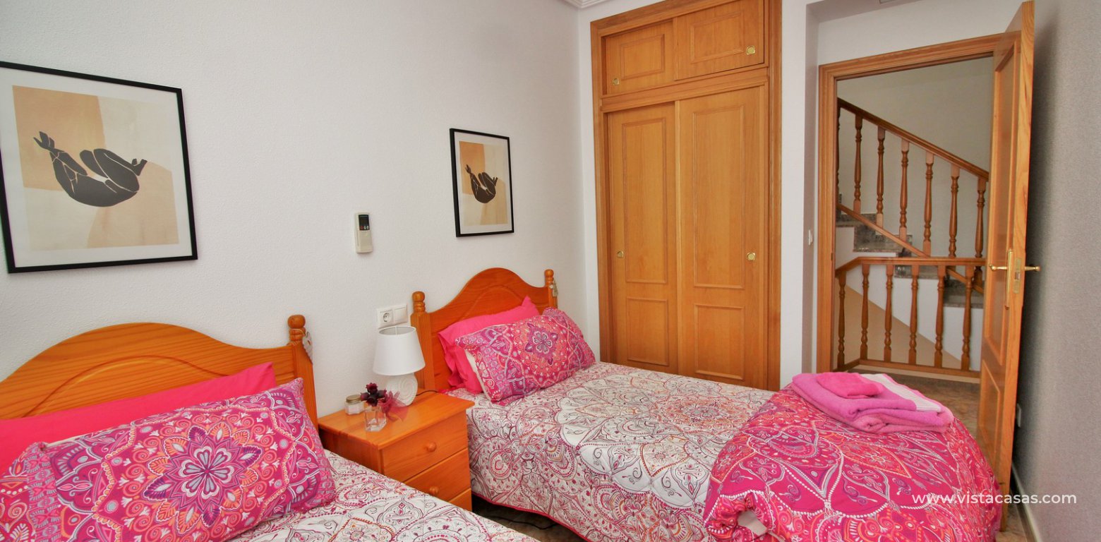 Townhouse for sale overlooking the pool R15 La Ciñuelica Punta Prima twin bedroom fitted wardrobes