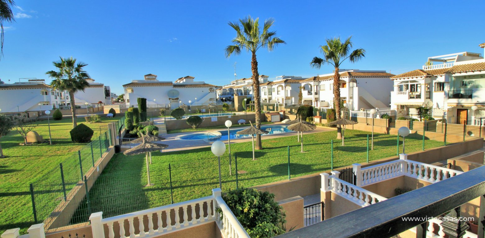 Townhouse for sale overlooking the pool R15 La Ciñuelica Punta Prima balcony pool view