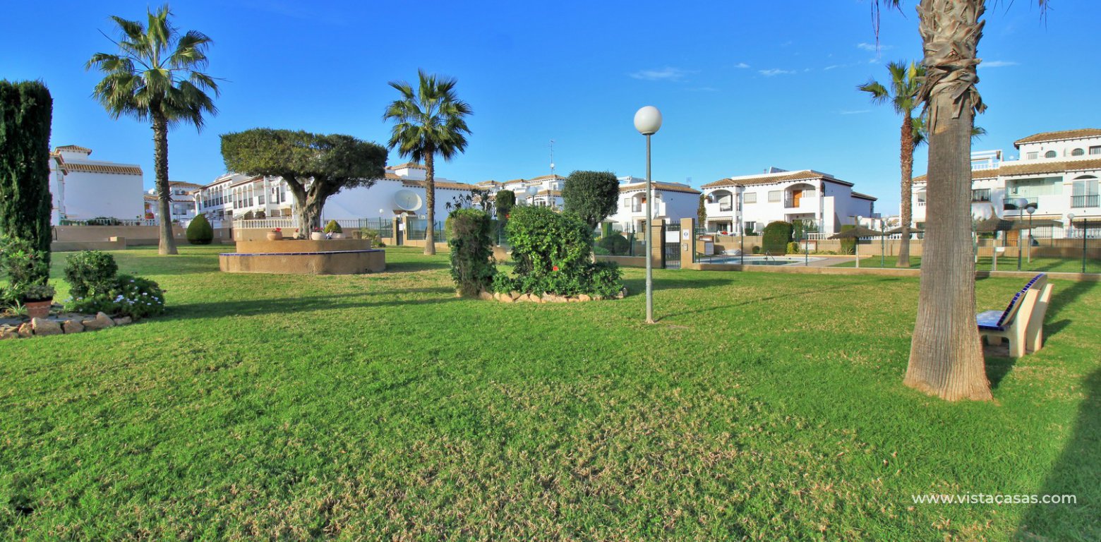 Townhouse for sale overlooking the pool R15 La Ciñuelica Punta Prima communal gardens