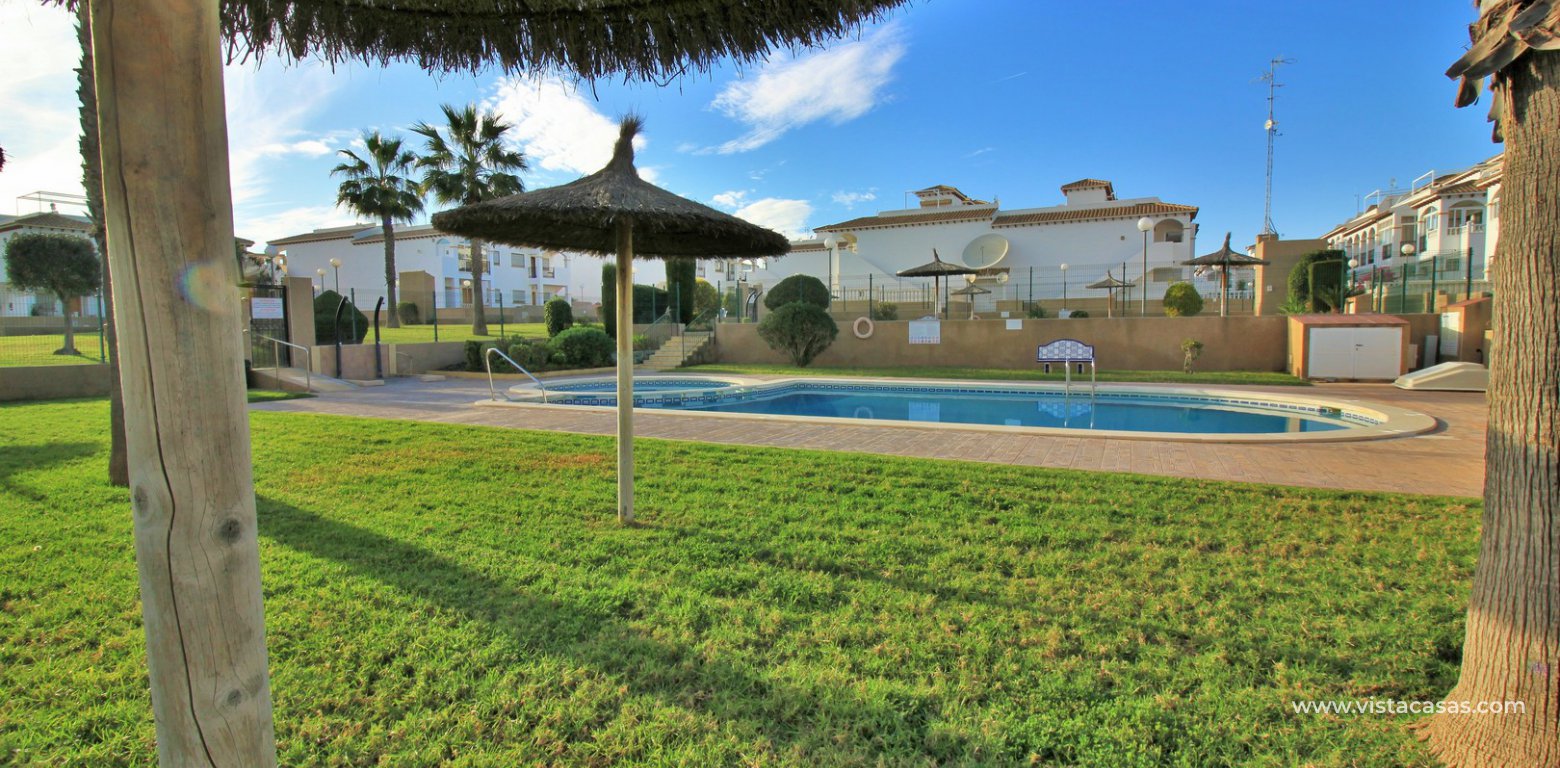 Townhouse for sale overlooking the pool R15 La Ciñuelica Punta Prima pool area