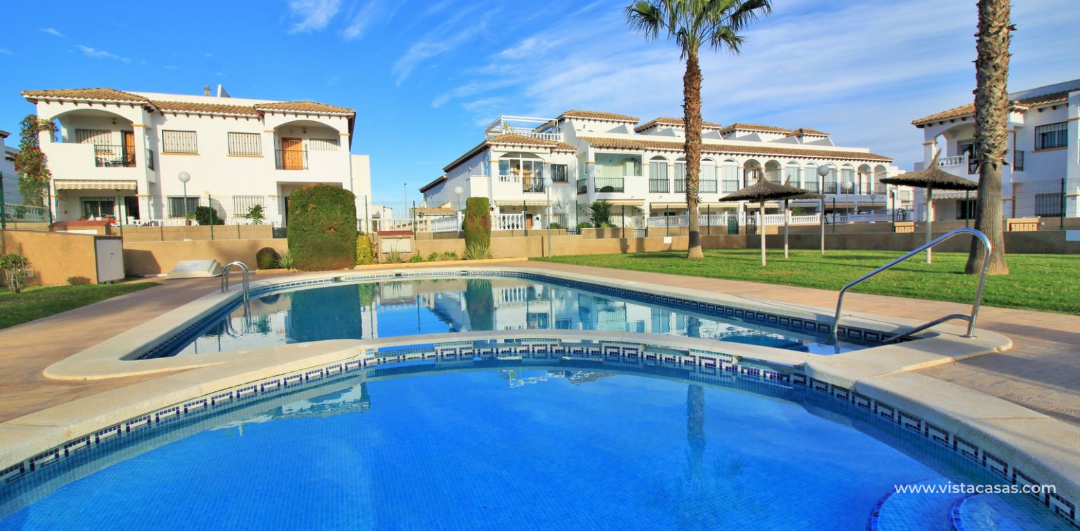 Townhouse for sale overlooking the pool R15 La Ciñuelica Punta Prima swimming pool