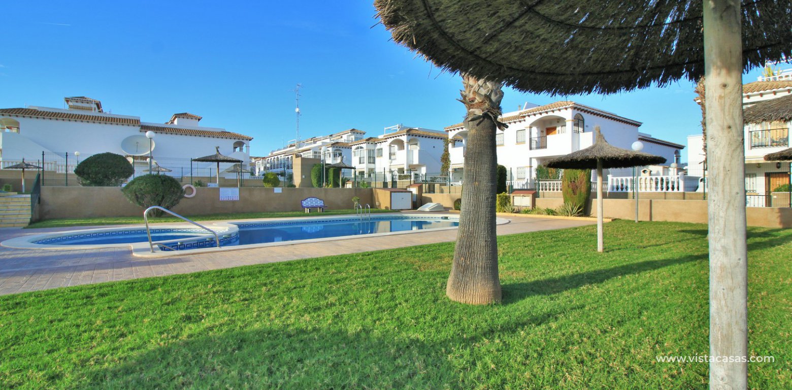 Townhouse for sale overlooking the pool R15 La Ciñuelica Punta Prima swimming pool