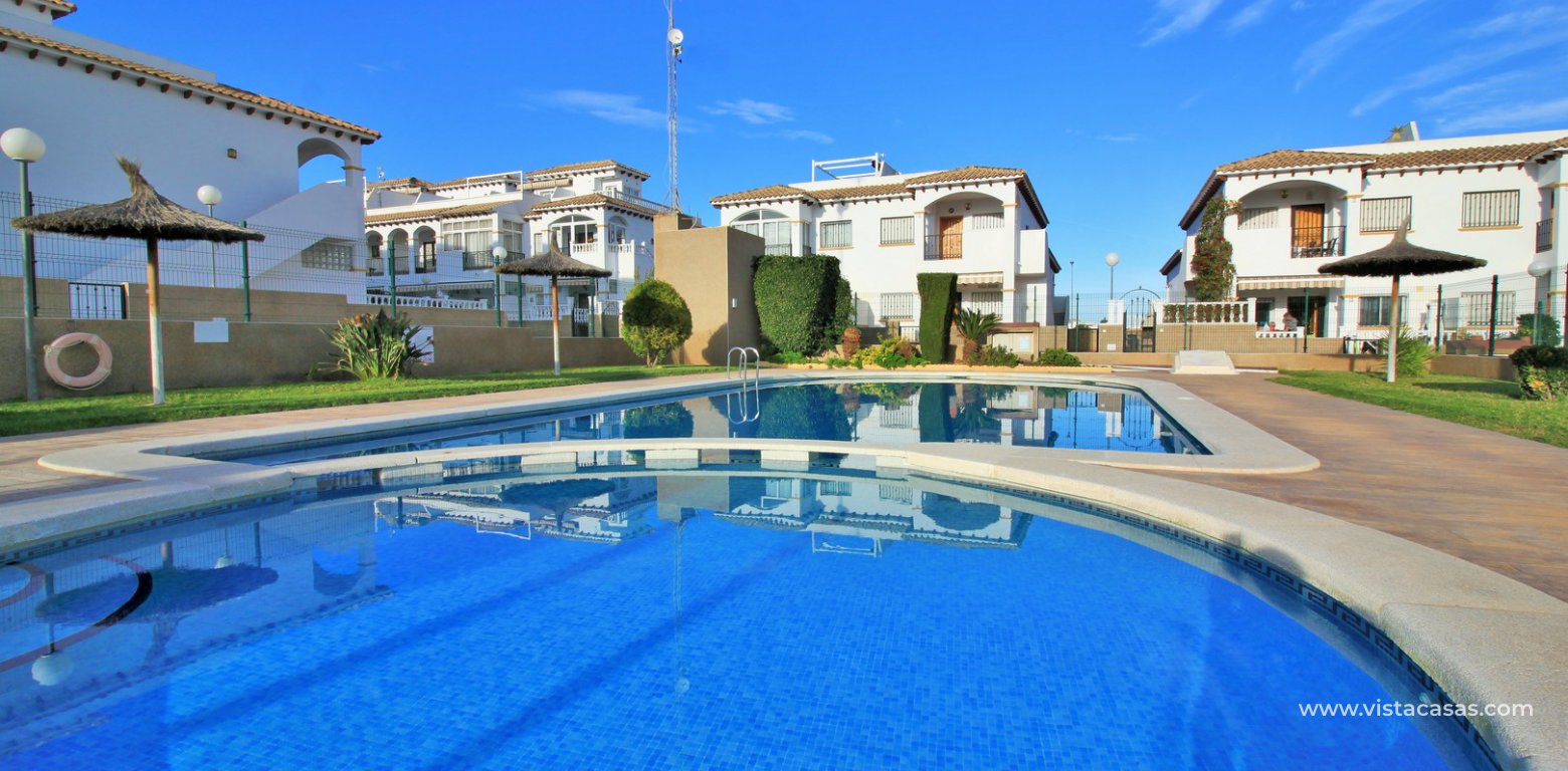 Townhouse for sale overlooking the pool R15 La Ciñuelica Punta Prima gated community