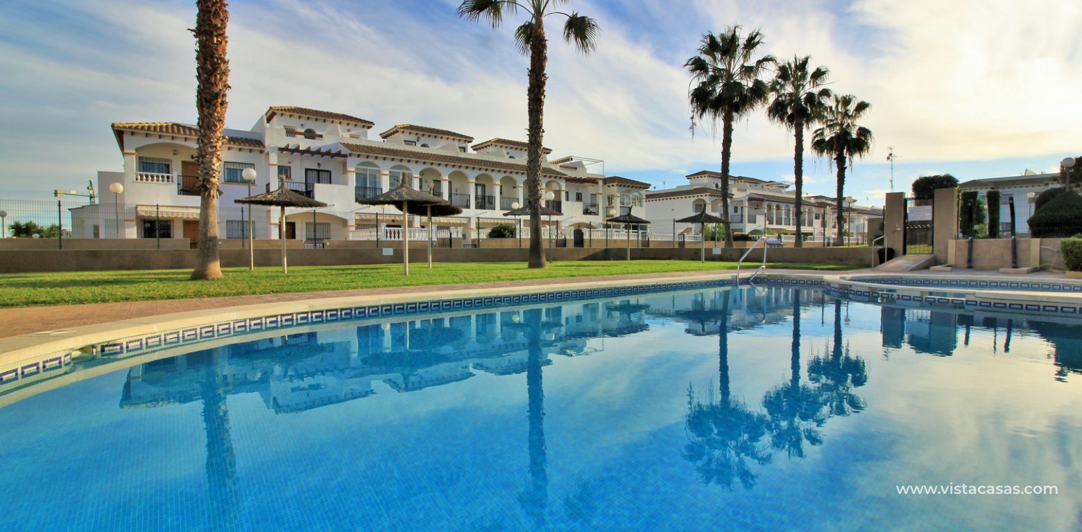 Townhouse for sale overlooking the pool R15 La Ciñuelica Punta Prima facing the pool