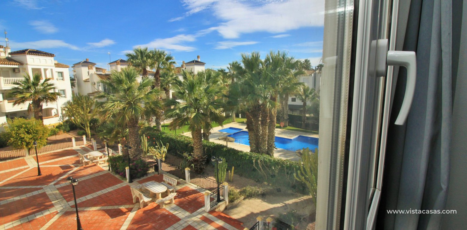 Duplex apartment for sale with golf and pool views Villamartin bedroom pool