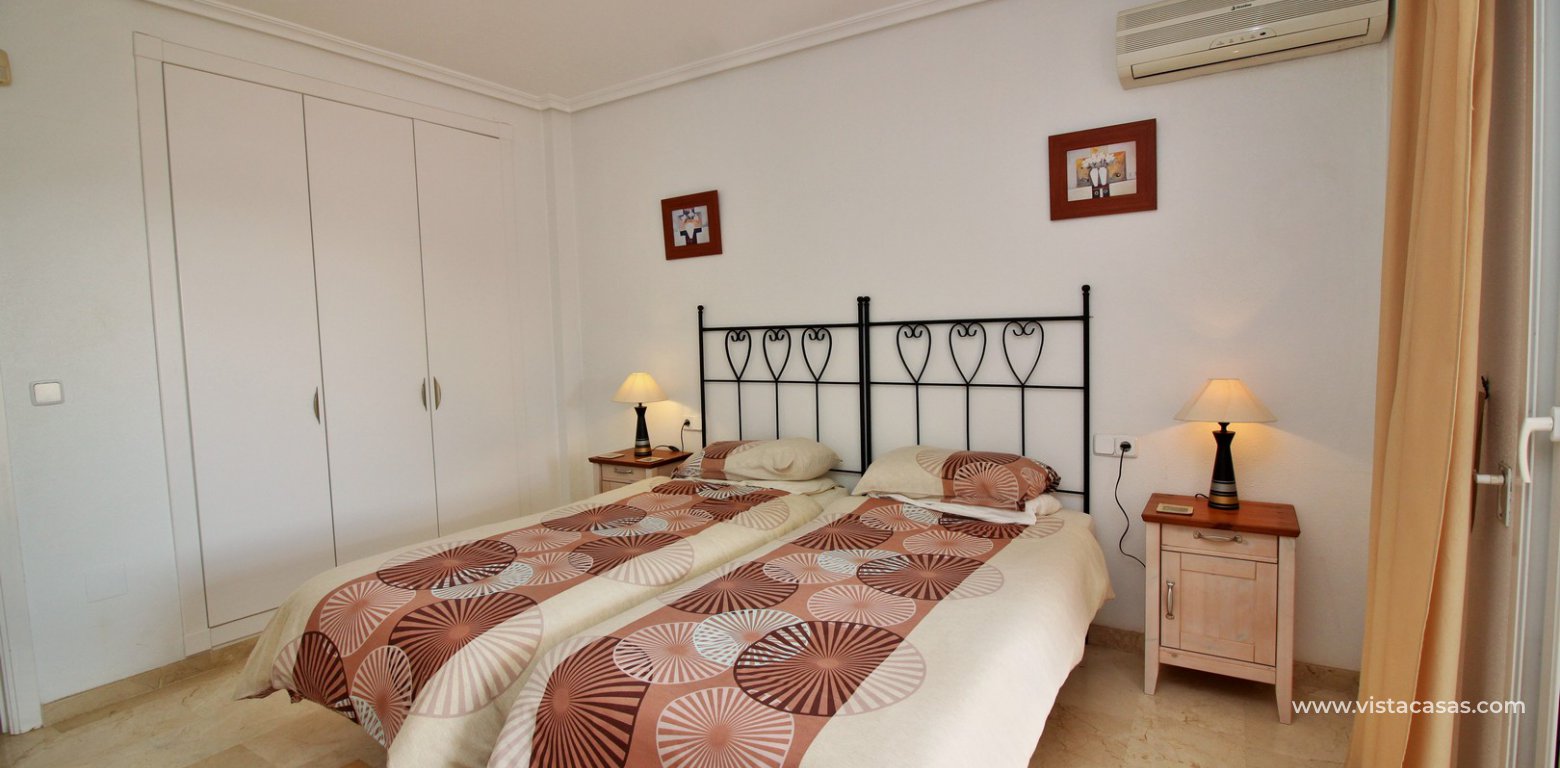 Duplex apartment for sale with golf and pool views Villamartin master bedroom fitted wardrobes