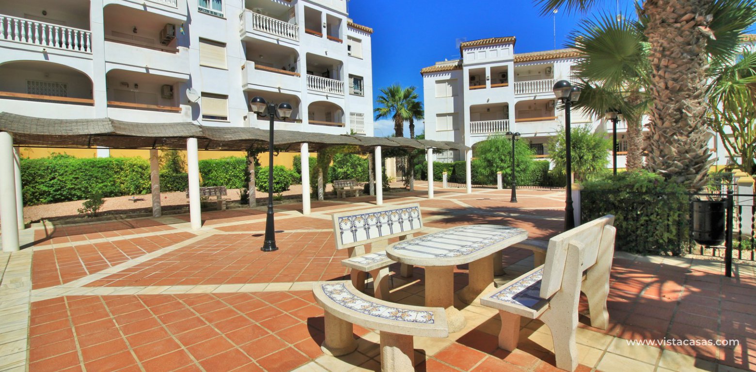 Duplex apartment for sale with golf and pool views Villamartin communal area