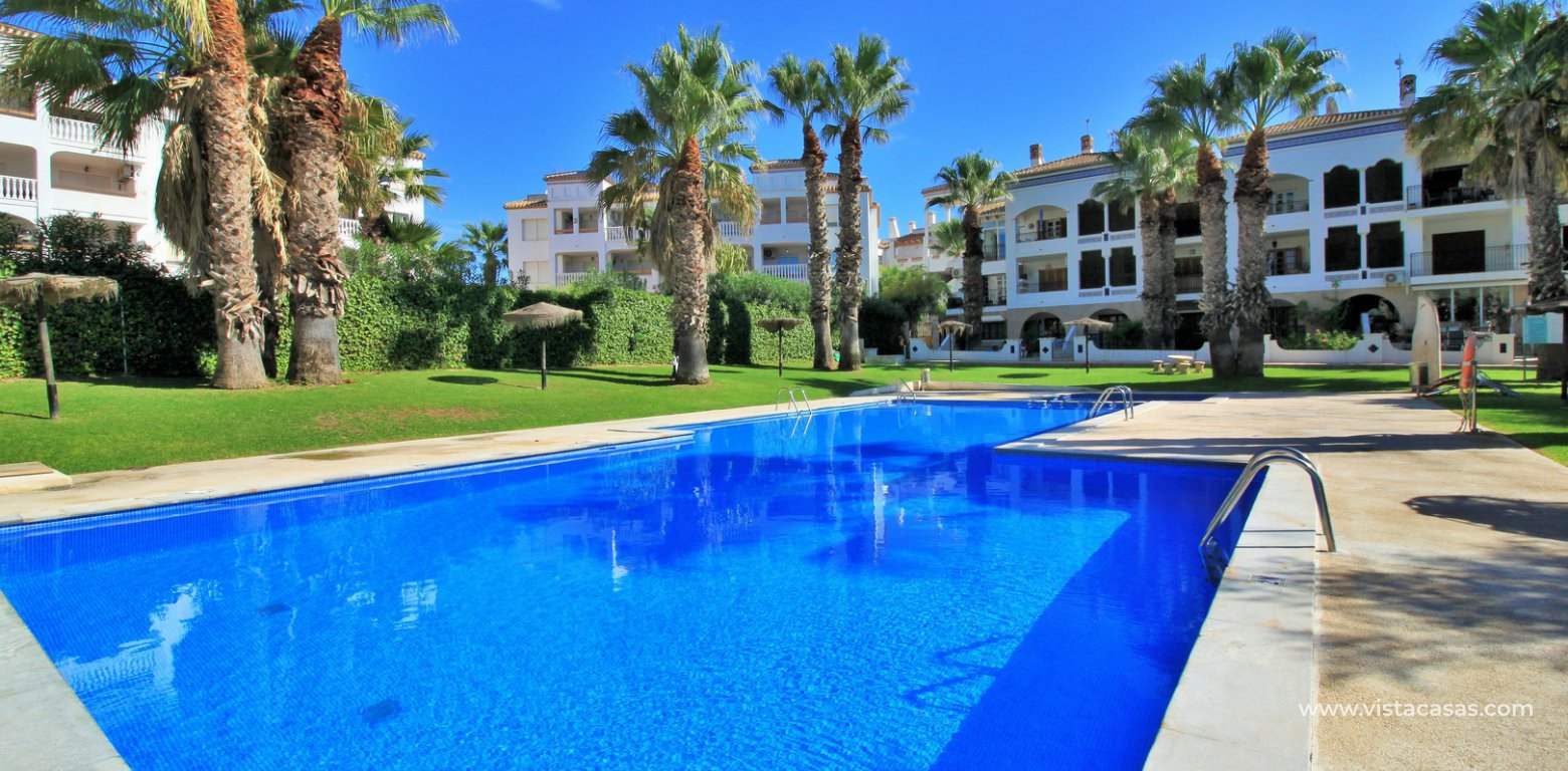 Duplex apartment for sale with golf and pool views Villamartin swimming pool