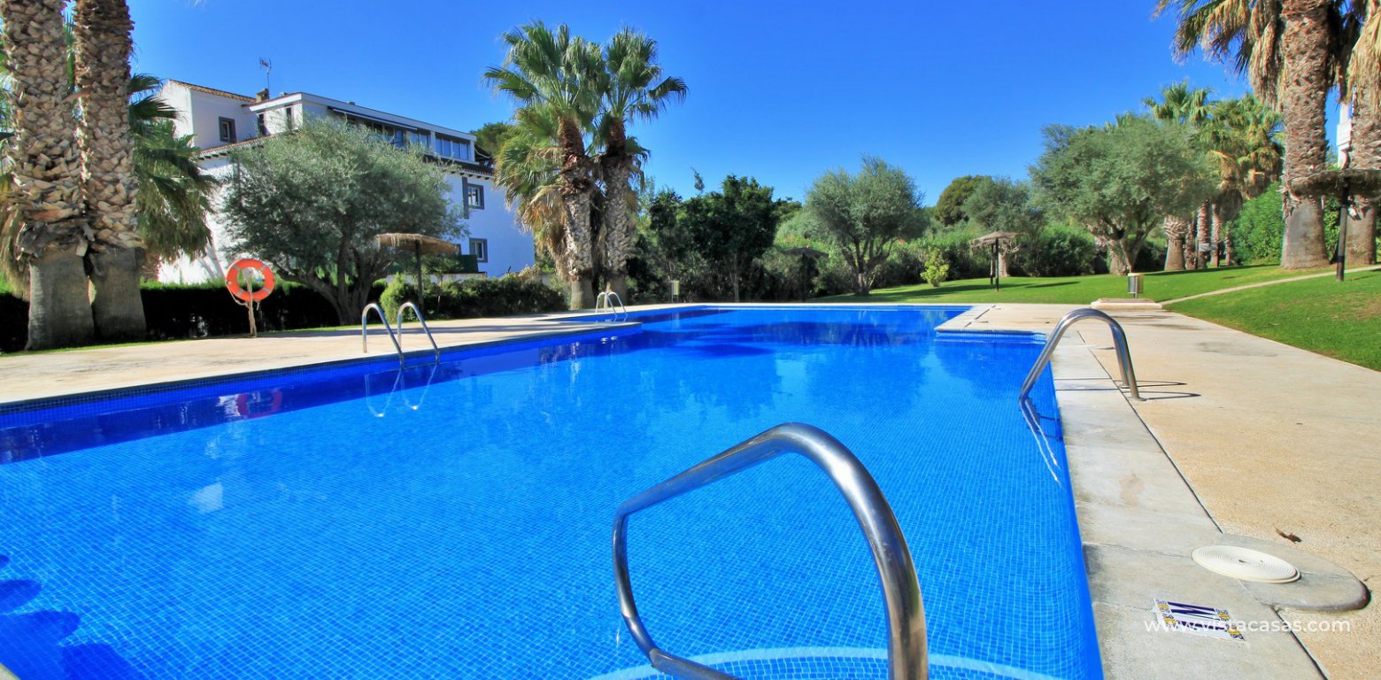Duplex apartment for sale with golf and pool views Villamartin pool