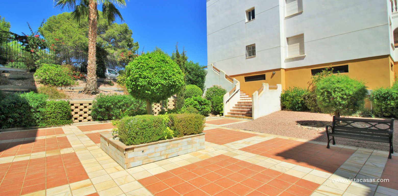 Duplex apartment for sale with golf and pool views Villamartin communal gardens