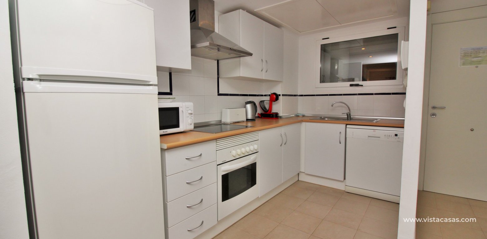 Apartment for sale overlooking the pool El Rincon Playa Flamenca Tourist Licence kitchen