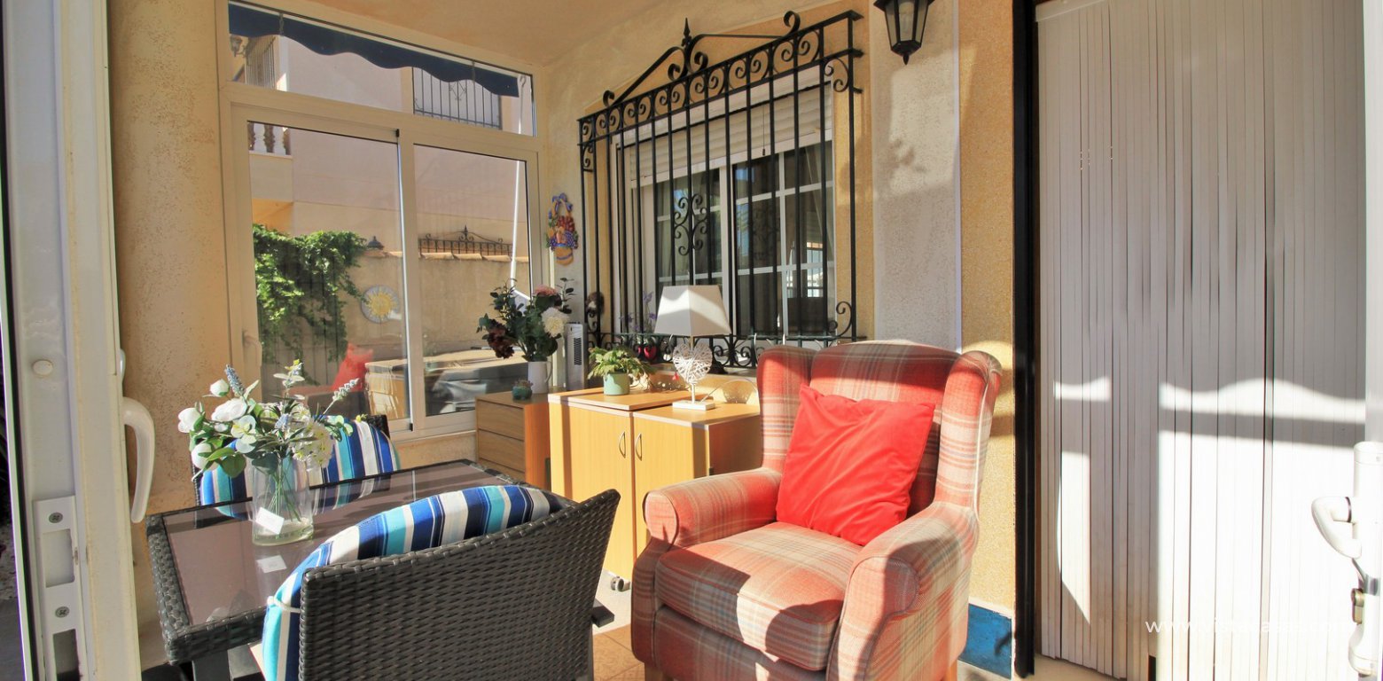 South facing 2 bedroom ground floor apartment for sale Sol Golf Pau 8 Villamartin sunny porch