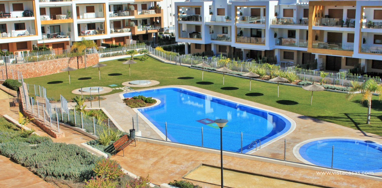 South facing apartment overlooking the pool for sale in Residencial Gala Los Dolses Orihuela Costa terrace pool view