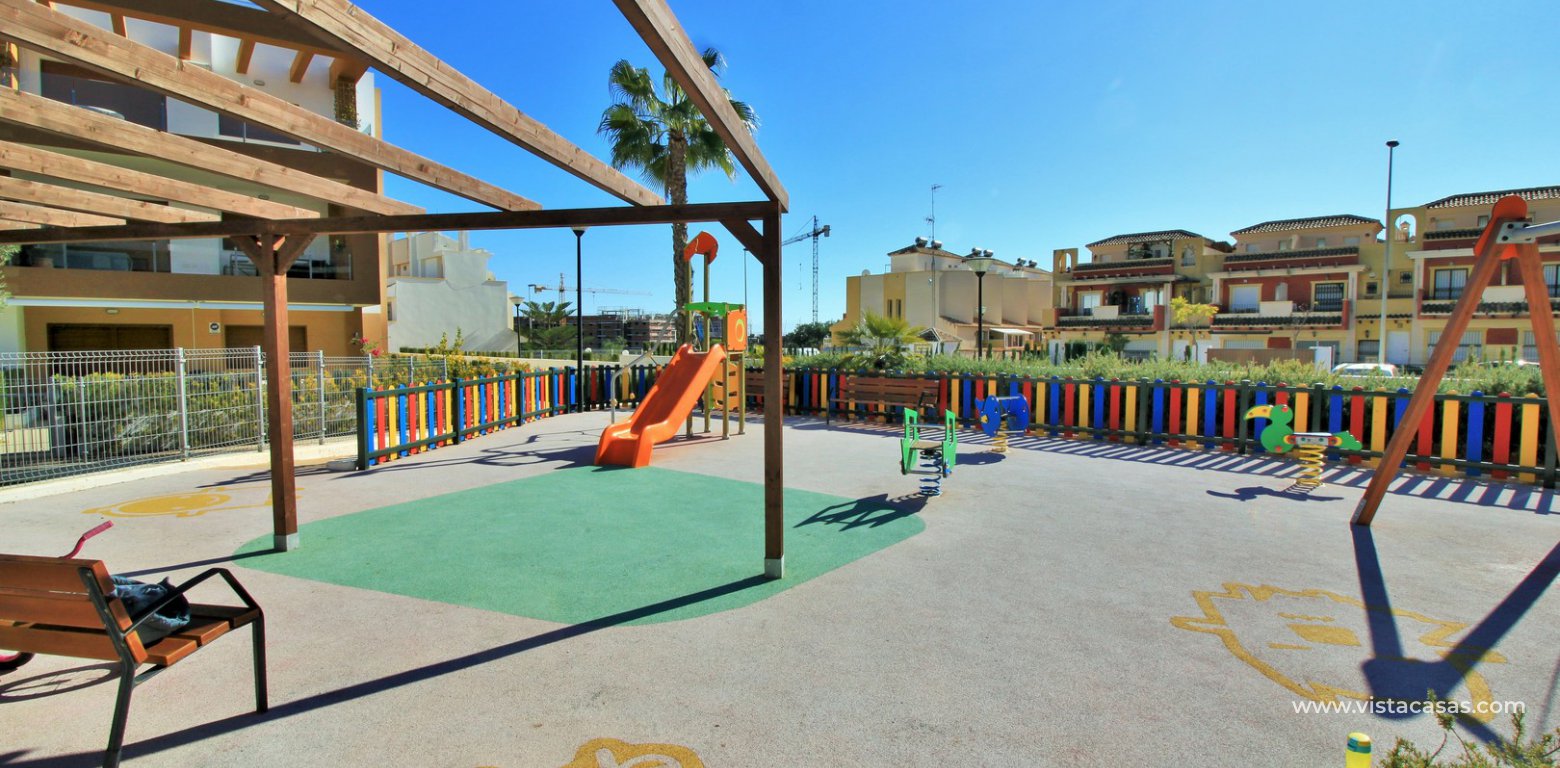 South facing apartment overlooking the pool for sale in Residencial Gala Los Dolses Orihuela Costa playground