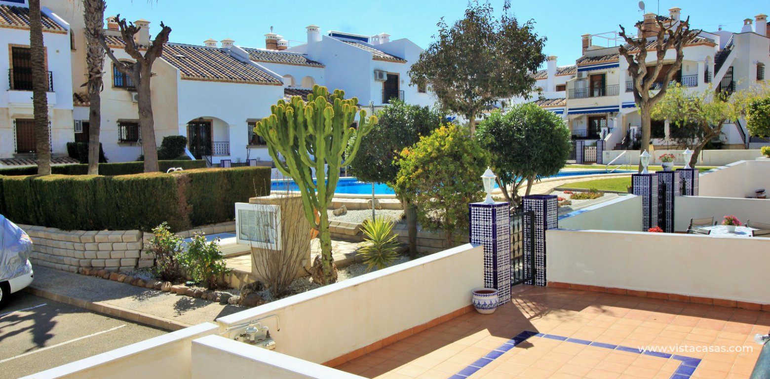 South facing sofia townhouse overlooking the pool for sale in Pau 8 Villamartin porch pool view