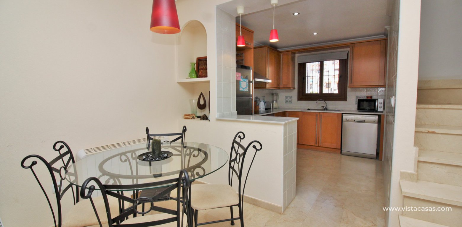 South facing sofia townhouse overlooking the pool for sale in Pau 8 Villamartin dining area